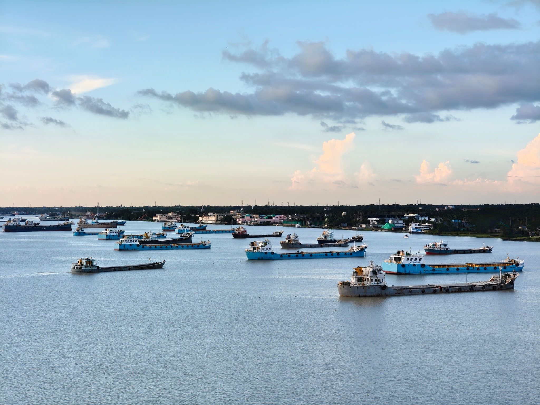 Merchant ships at anchor in a bunkering port