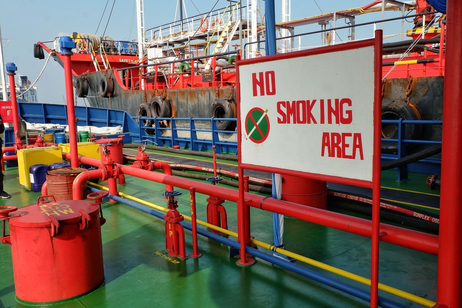 Bunker hoses and pipelines on the deck of a bunker barge